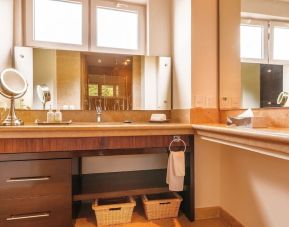 Day use room with guest bathroom at Grand Miramar All Luxury Suites & Residences.