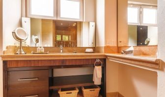 Day use room with guest bathroom at Grand Miramar All Luxury Suites & Residences.