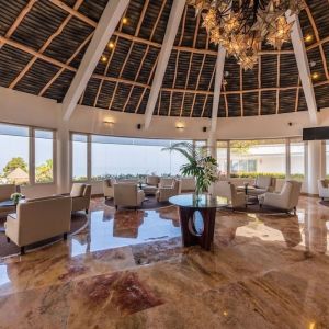 Lobby and lounge at Grand Miramar All Luxury Suites & Residences.