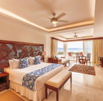 Spacious king room with terrace at Grand Miramar All Luxury Suites & Residences.