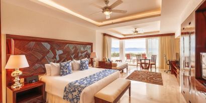 Spacious king room with terrace at Grand Miramar All Luxury Suites & Residences.