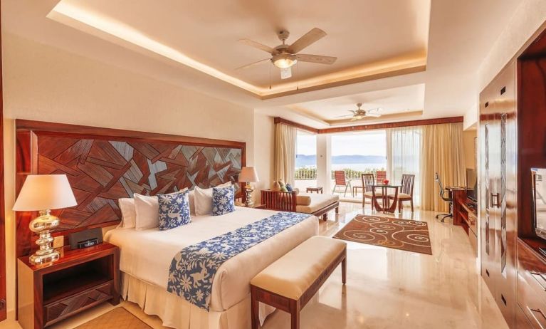 Spacious king room with terrace at Grand Miramar All Luxury Suites & Residences.