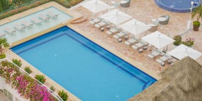 Large outdoor pool at Grand Miramar All Luxury Suites & Residences.