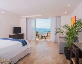 Romantic king room with sea view at Hotel Delfin PV Beach Resort.