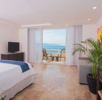 Romantic king room with sea view at Hotel Delfin PV Beach Resort.