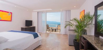 Romantic king room with sea view at Hotel Delfin PV Beach Resort.