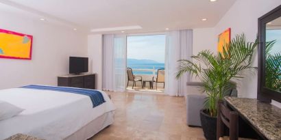 Romantic king room with sea view at Hotel Delfin PV Beach Resort.