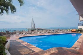 Luxurious outdoor pool at Hotel Delfin PV Beach Resort.