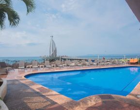 Luxurious outdoor pool at Hotel Delfin PV Beach Resort.