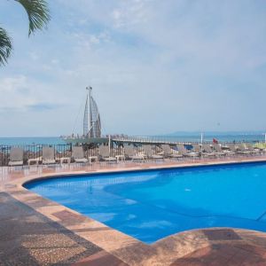 Luxurious outdoor pool at Hotel Delfin PV Beach Resort.