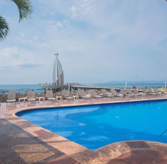 Luxurious outdoor pool at Hotel Delfin PV Beach Resort.