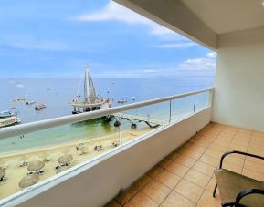 Day use room with outdoor terrace at Hotel Delfin PV Beach Resort.