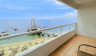 Day use room with outdoor terrace at Hotel Delfin PV Beach Resort.