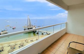 Day use room with outdoor terrace at Hotel Delfin PV Beach Resort.