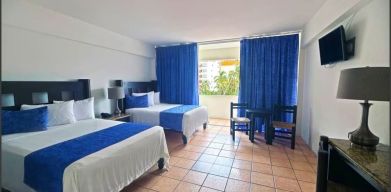 Spacious day use room with natural light at Hotel Delfin PV Beach Resort.