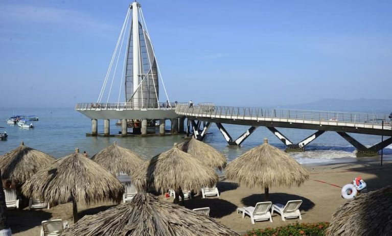 Beach access and marina at Hotel Delfin PV Beach Resort.