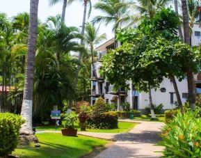 Hotel gardens at Puerto De Luna Pet Friendly & Family Suites.