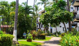 Hotel gardens at Puerto De Luna Pet Friendly & Family Suites.