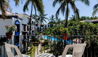 Balcony with pool view at Puerto De Luna Pet Friendly & Family Suites.