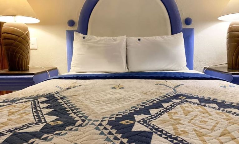 Romantic king room at Puerto De Luna Pet Friendly & Family Suites.