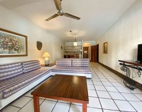 Day use room with lounge area at Puerto De Luna Pet Friendly & Family Suites.