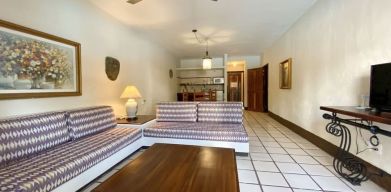 Day use room with lounge area at Puerto De Luna Pet Friendly & Family Suites.