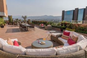 Rooftop terrace and coworking space at Suites Perisur Furnished Apartments.