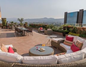 Rooftop terrace and coworking space at Suites Perisur Furnished Apartments.