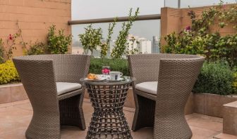 Terrace and seating area at Suites Perisur Furnished Apartments.