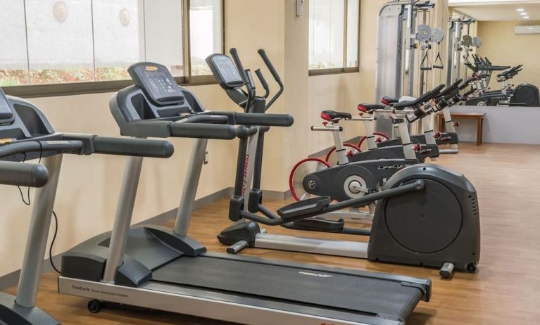 Fitness center at Suites Perisur Furnished Apartments.