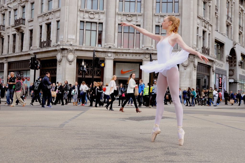 A ballerina holds her pose in London's Oxford Circus. 