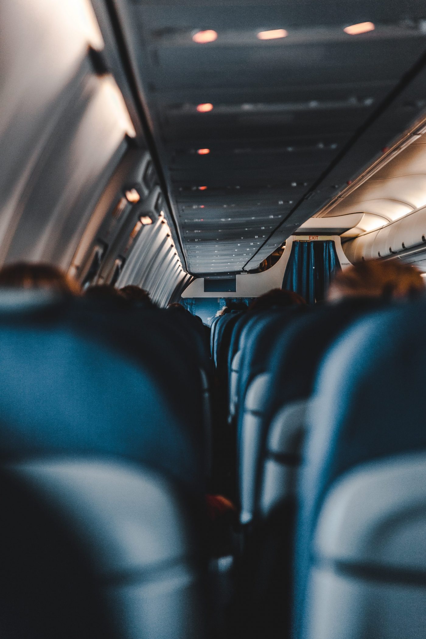 How to Survive a Long Flight - back to front view airplane cabin