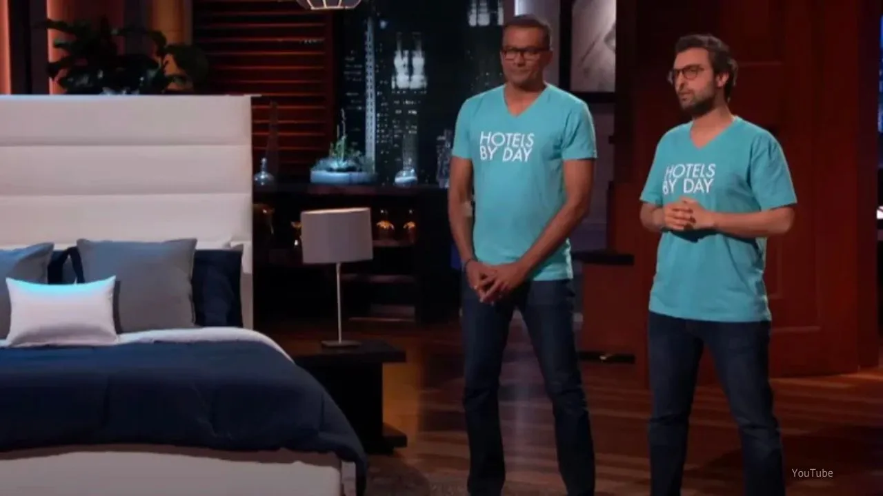 Two men present "Hotels By Day" on Shark Tank stage