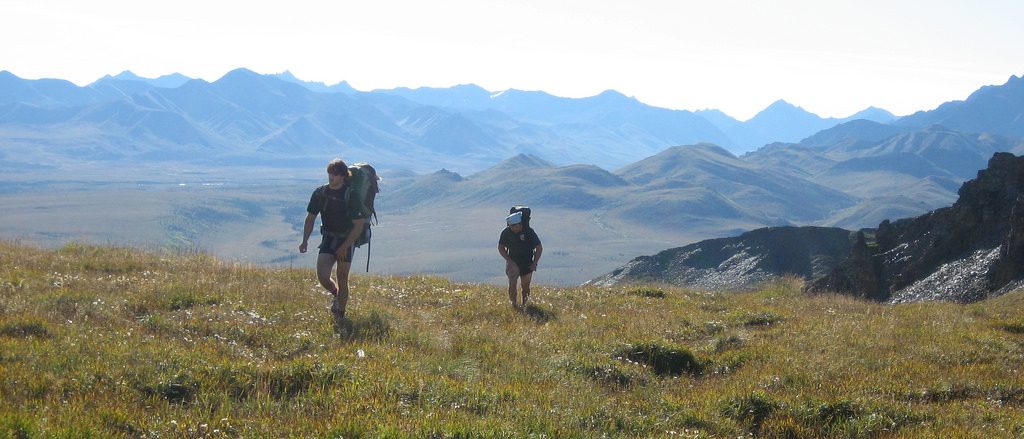 Two hikers make their way through Denali National Park in Alaska to reach Christopher McCandless' Magic Bus site.