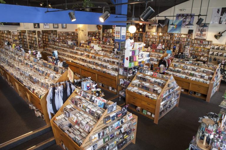 Rows and rows of record shelves filled with vinyl inside the famed Waterloo Records in Austin, Tx.